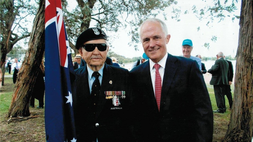 Henryk Frank Kustra standing with Prime Minister Malcolm Turnbull