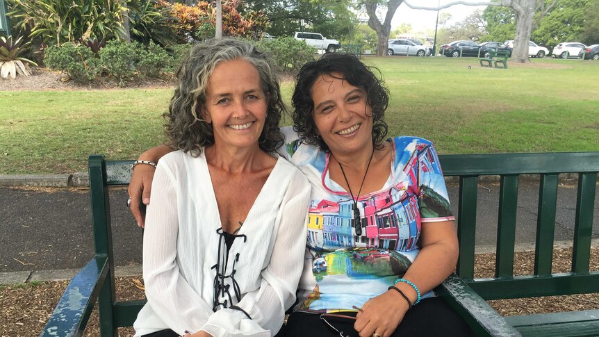 Julie Carrington (left) and Lea Sanson plan to adopt their foster child once the laws are passed.