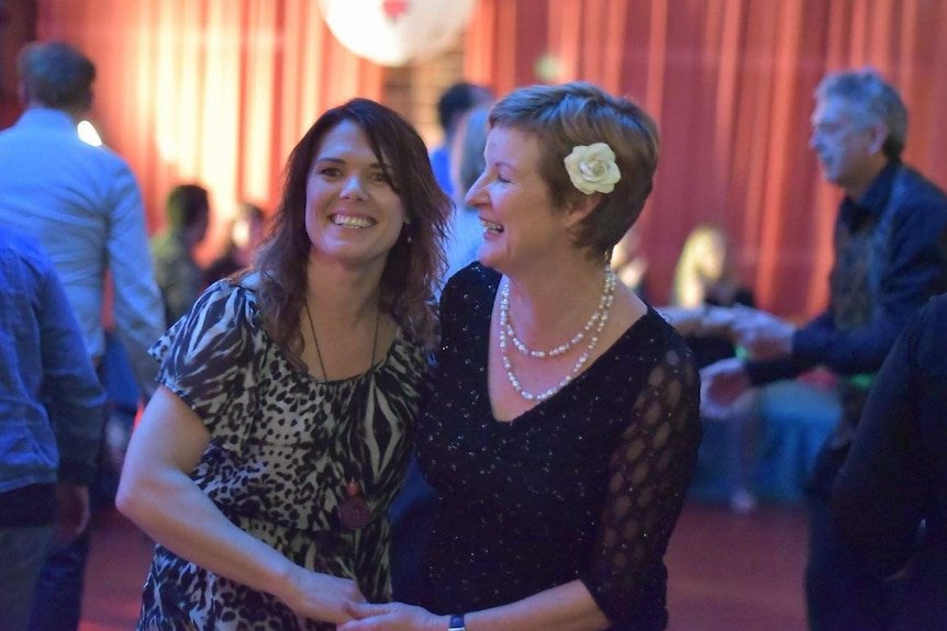 A photo of Marion Christie dancing with Amy Watts