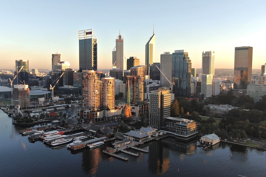 Perth's skyline illuminated by the morning sunrise