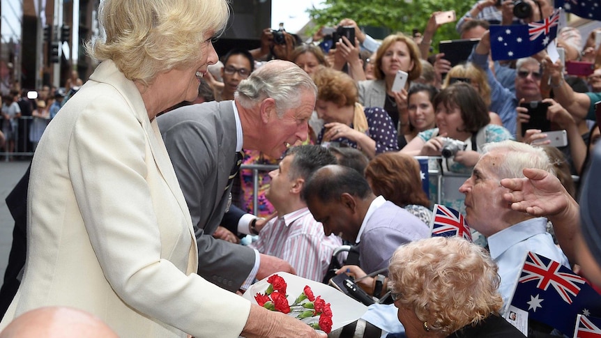 Prince Charles and the Duchess of Cornwall meet with members of the public in Martin Place.
