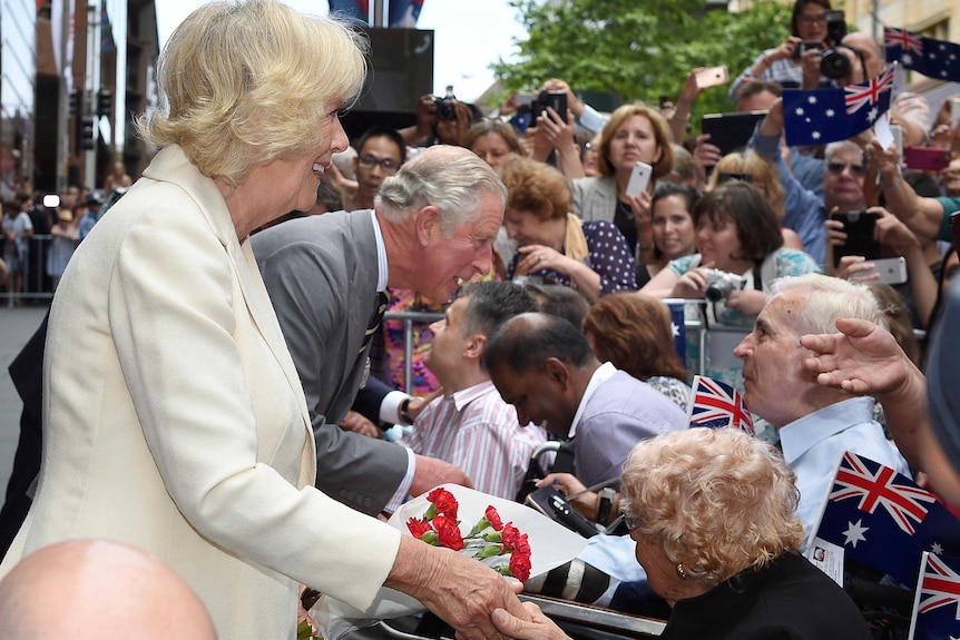 Prince Charles and the Duchess of Cornwall meet with members of the public in Martin Place.