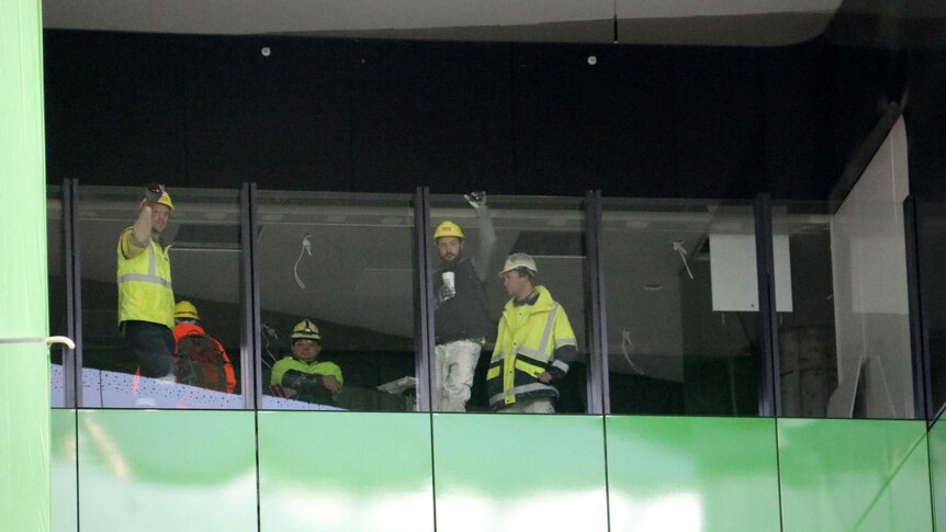 5 construction workers standing in the Perth Children's Hospital