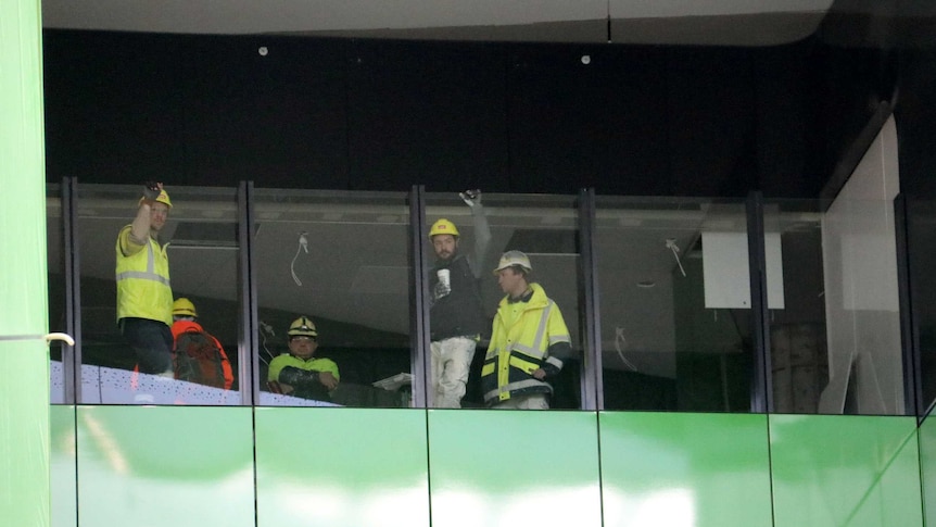 5 construction workers standing in the Perth Children's Hospital