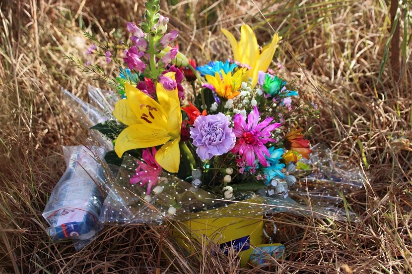 A tribute for suspected murder victim Donna Steele left at Leggett's Crossing near Cooktown.