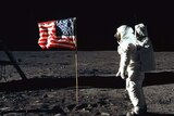 Buzz Aldrin with the US flag on the moon in 1969