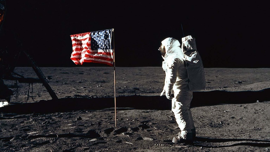 Buzz Aldrin with the US flag on the moon in 1969