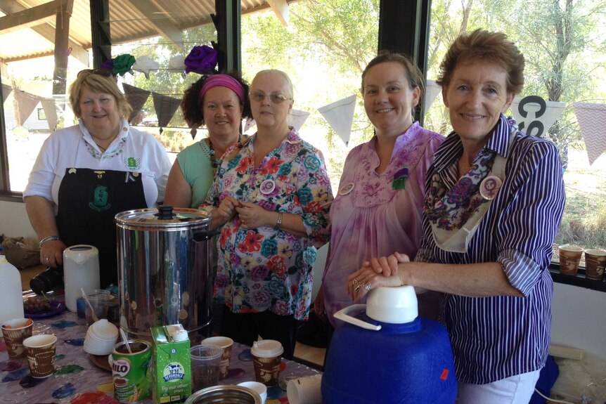 The Tennant Creek Country Women's Association team serving tea and coffee at a public breakfast.