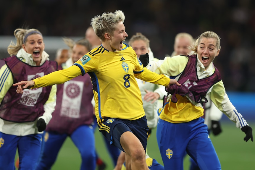 Sweden's Lina Hurtig runs away with her team after beating USA in the Women's World Cup round of 16.