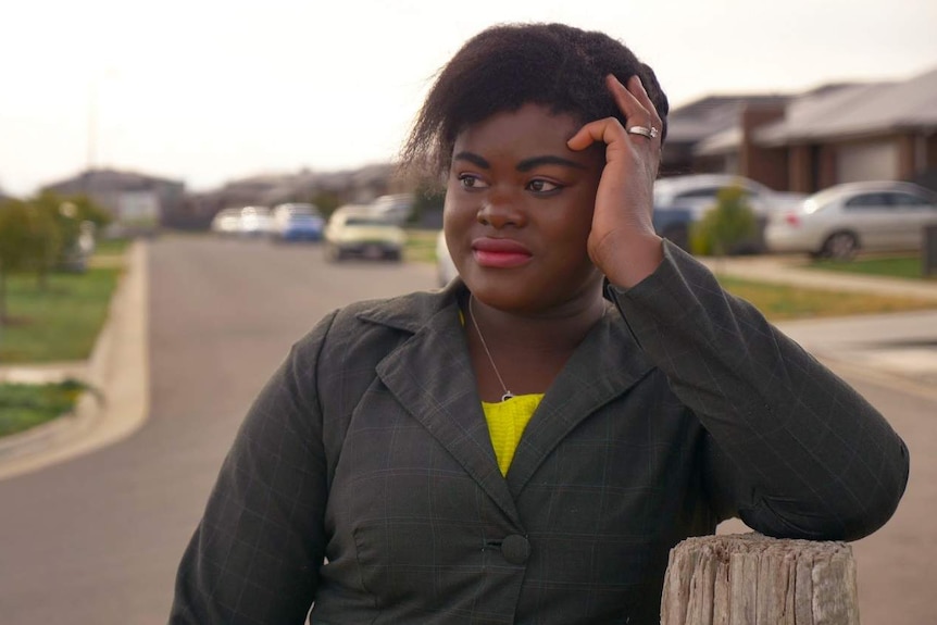 Lamourette Folly, an African-Australian woman, standing on a street in Ballarat in 2020.