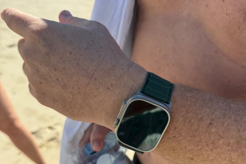 smart watch on swimmer's arm