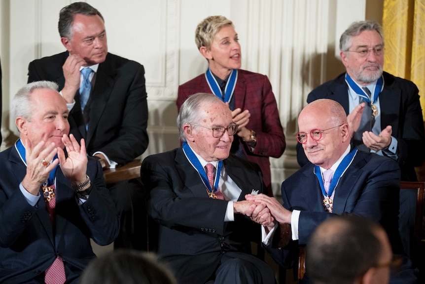 6 of the recipients, including ellen degeneres and robert deniro applaud as they watch the ceremony.