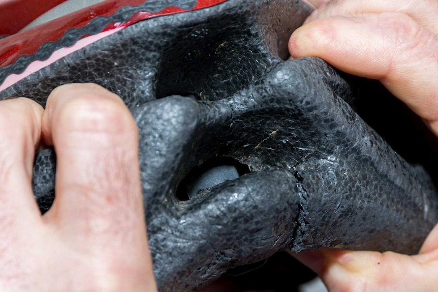 Cracked helmet after crash