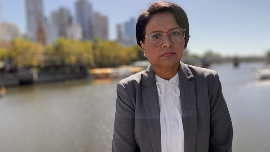 Labor MP Kaushaliya Vaghela standing with the Yarra River and Melbourne CBD behind her.