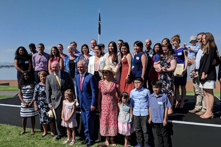People who have been granted citizenship at the Australia Day citizenship ceremony in Canberra.
