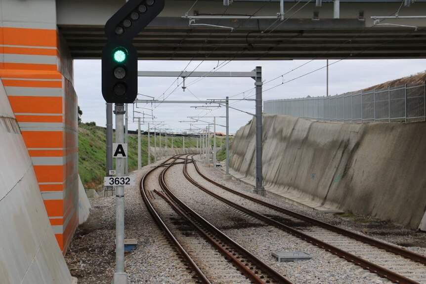 empty rail line and green light signal Adelaide