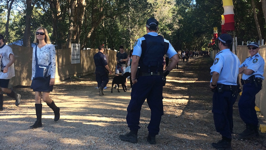 Police at the entrance to Splendour in the Grass in Byron Bay.