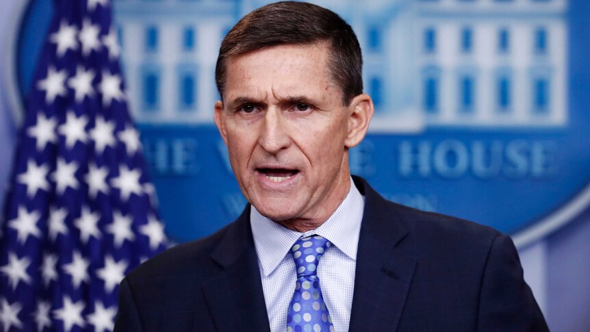 Michael Flynn gives a talk at the White House. His brow is furrowed and mouth partly open.