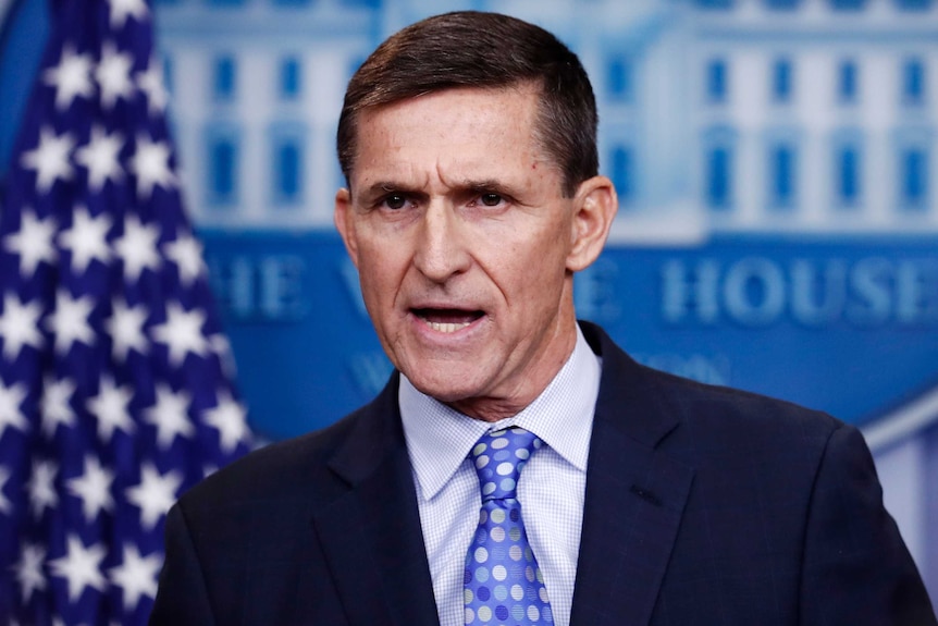 Michael Flynn gives a talk at the White House. His brow is furrowed and mouth partly open.
