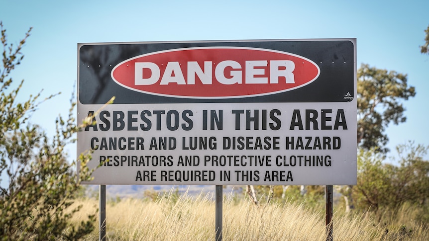 A Danger sign warning of asbestos in the area.