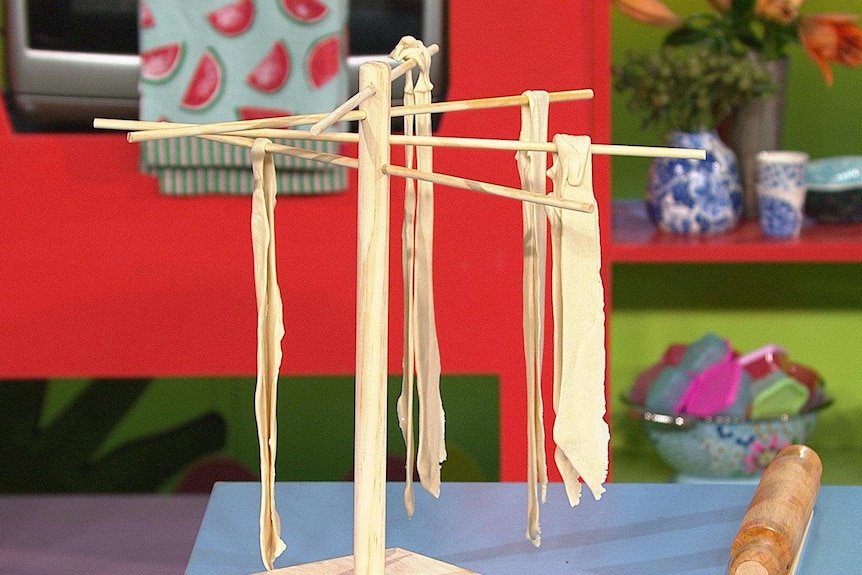 Uncooked noodles hanging