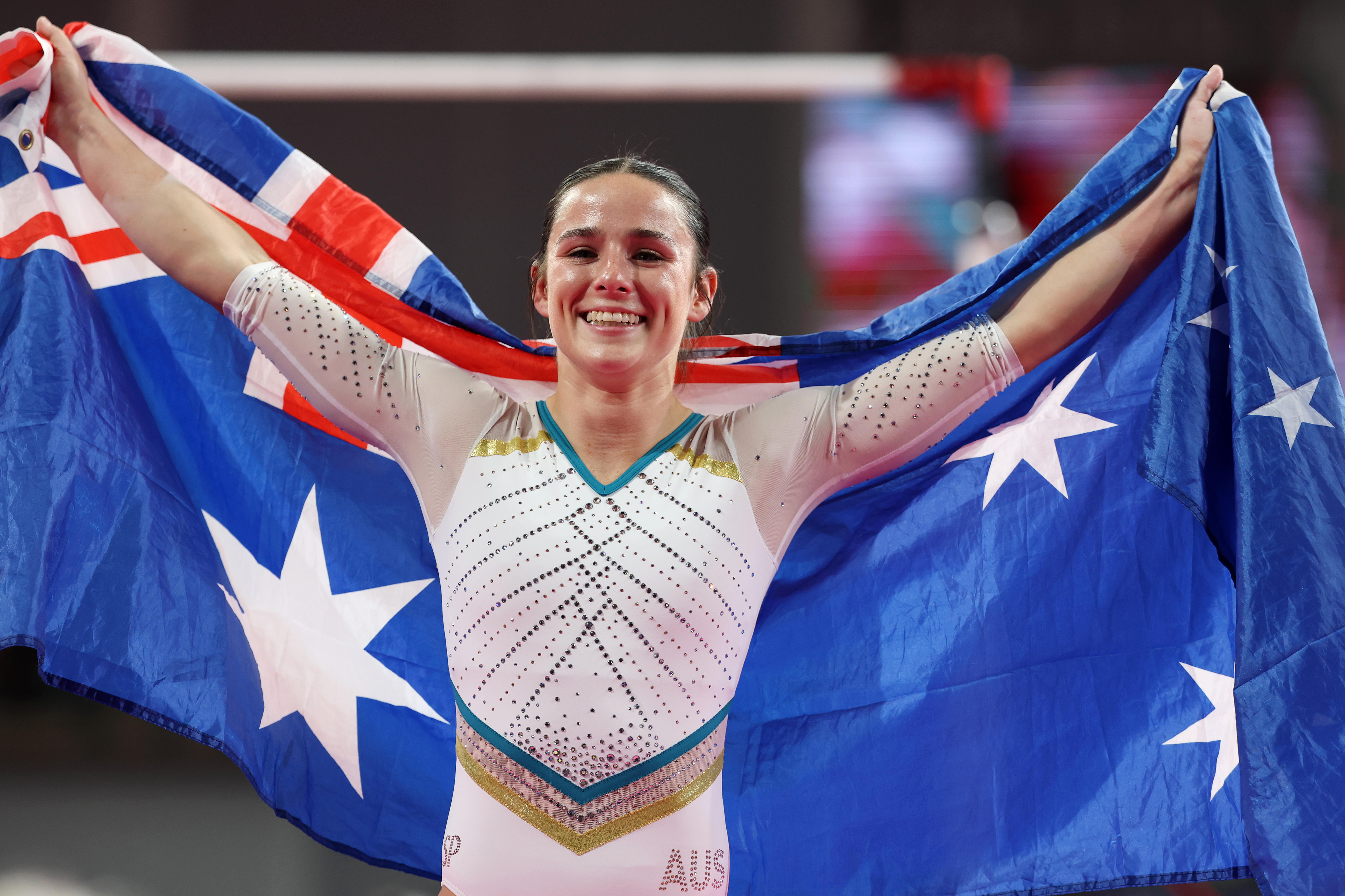 Kate McDonald holds up a flag