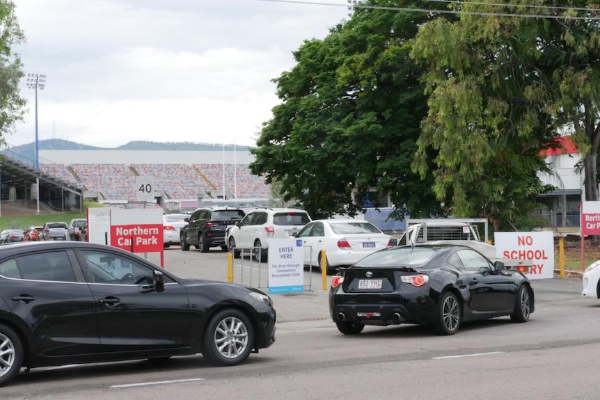 A line of cars queueing for Covid-19 tests in Townsville stadium