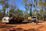 Drill rig working in bushland north of Kununurra, WA