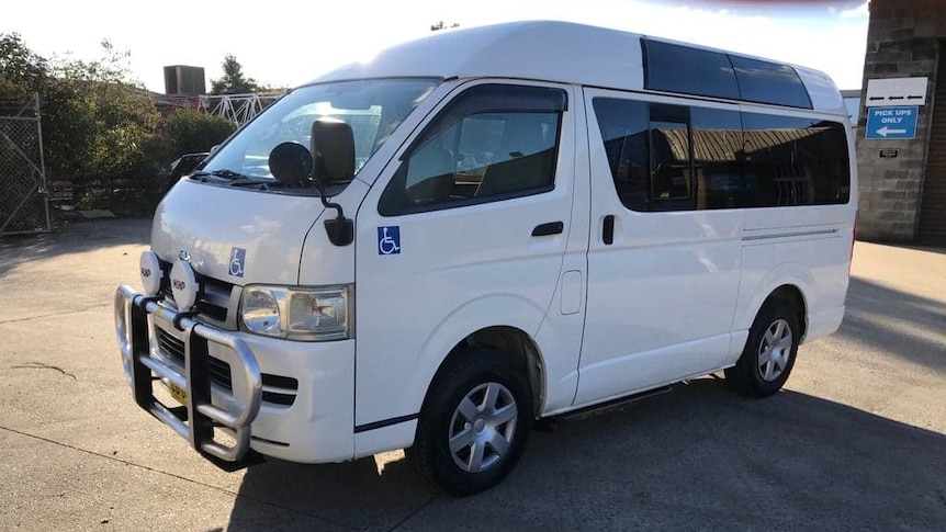 Image of white mini bus