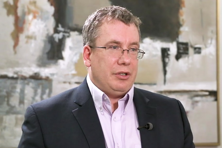 Canadian lawyer Russ Weninger speaking in his office