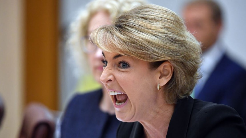 Michaelia Cash pulls a face with her mouth open.