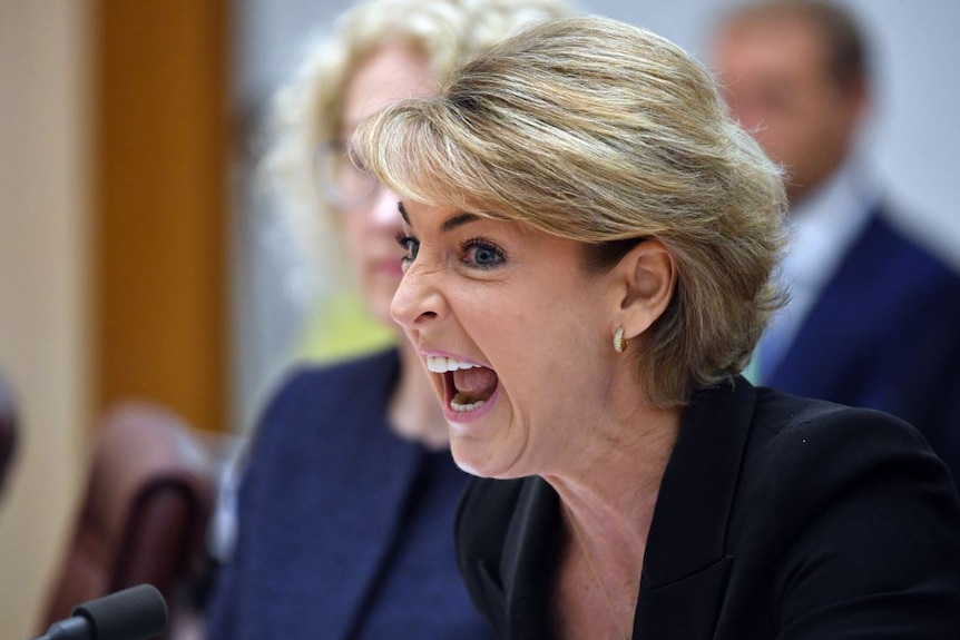 Michaelia Cash pulls a face with her mouth open.