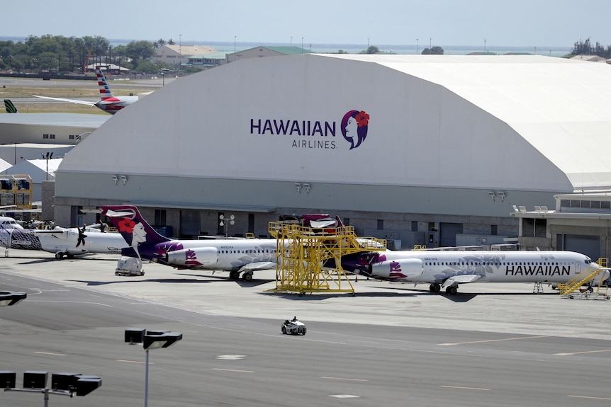 A air hanger with Hawaiian airlines out the front