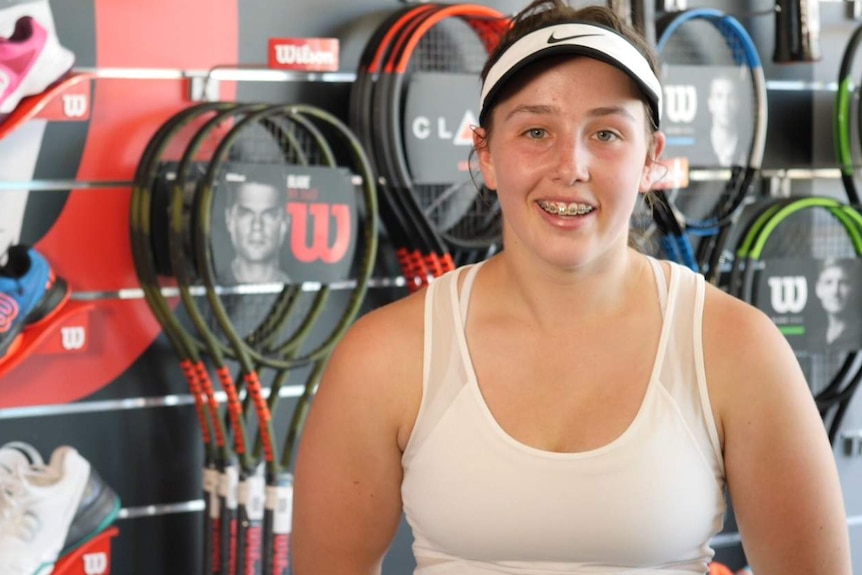 Tennis player Ruby Rothman smiling at the camera