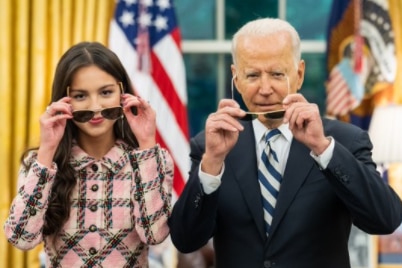 Olivia Rodrigo and US President Joe Biden try on sunglasses