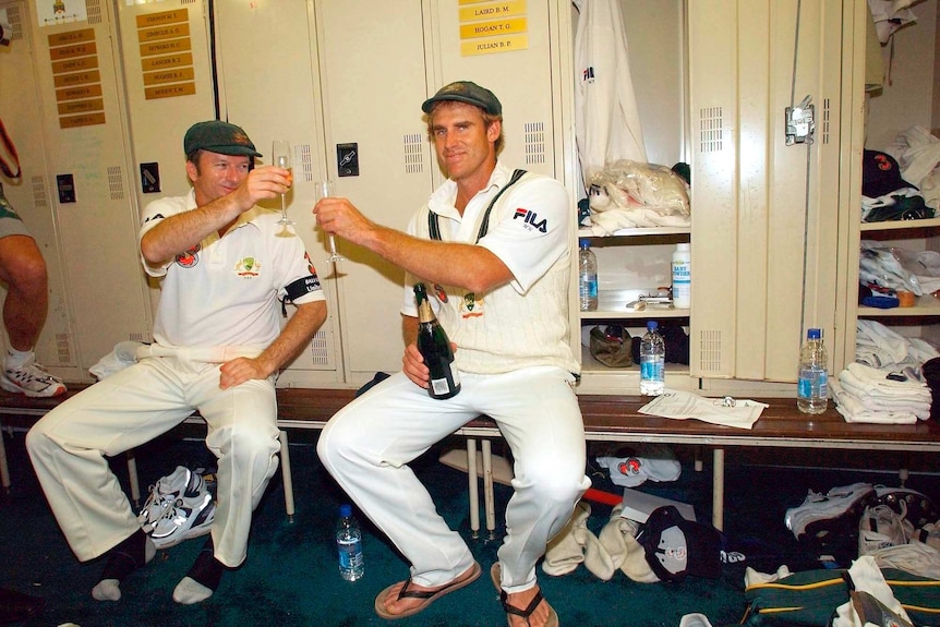 Matthew Hayden and Steve Waugh sit in the changerooms at the WACA Ground in their Test cricket whites drinking champagne.