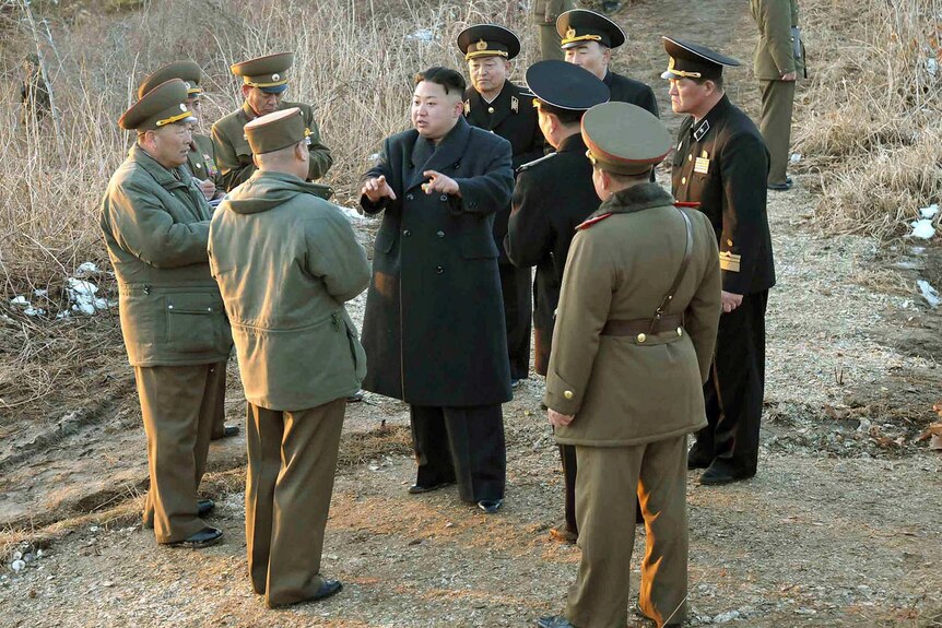 Kim Jong Un meets with military officials
