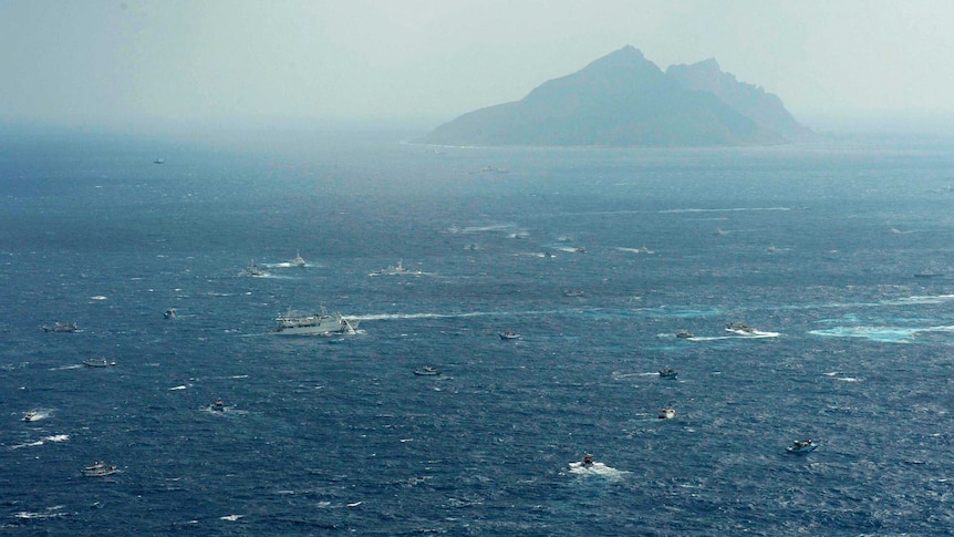 A Japan coast guard patrol among Taiwan ships near Uotsuri island, part of Senkaku archipelago