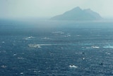 A Japan coast guard patrol among Taiwan ships near Uotsuri island, part of Senkaku archipelago