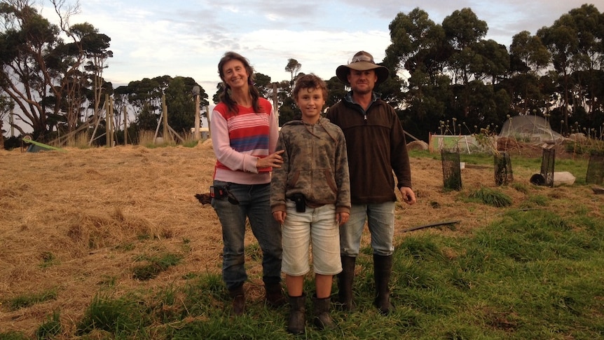 Carmen Holloway and James Hill, with their son Evan, on their new farm on King Island which is being opened to tourists