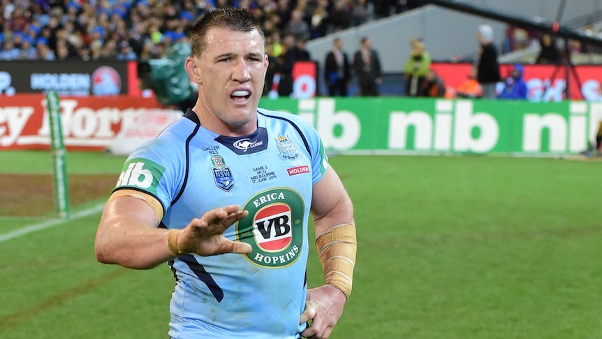 Paul Gallen clutches his side during State of Origin II