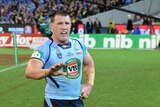 Paul Gallen clutches his side during State of Origin II