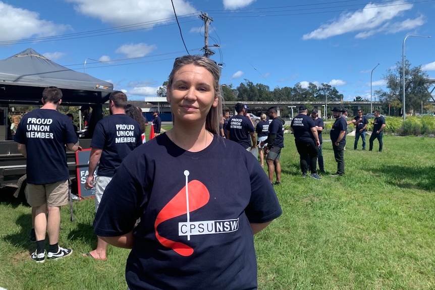 Woman in CPSU uniform smiles at the camera 