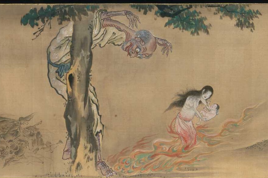 ghostly monster figures painted on a handscroll with ink