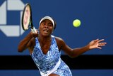Venus Williams plays a shot in the round of 16