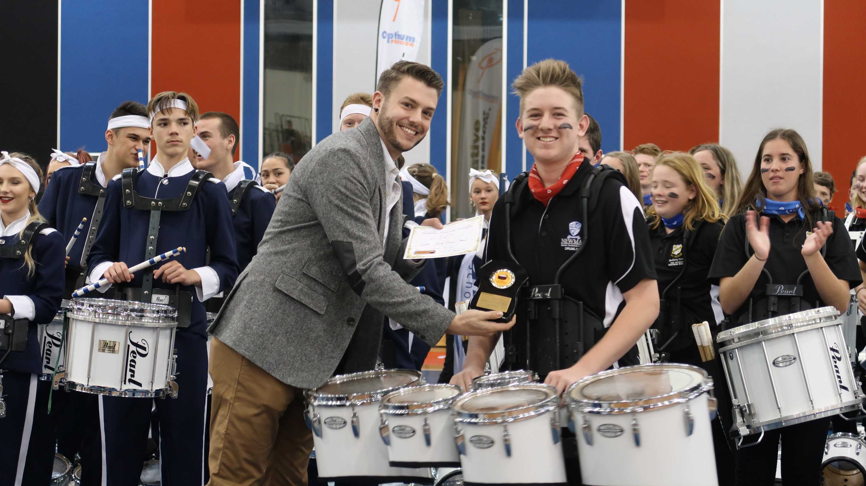 Drumlines teach young marching percussion bands the value of teamwork