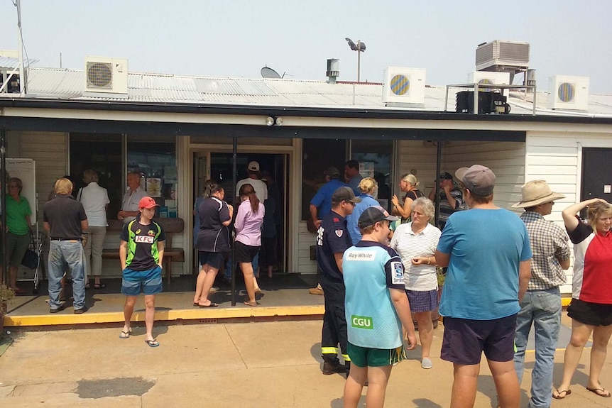 Coolah residents pack a sports club for a bushfire update.