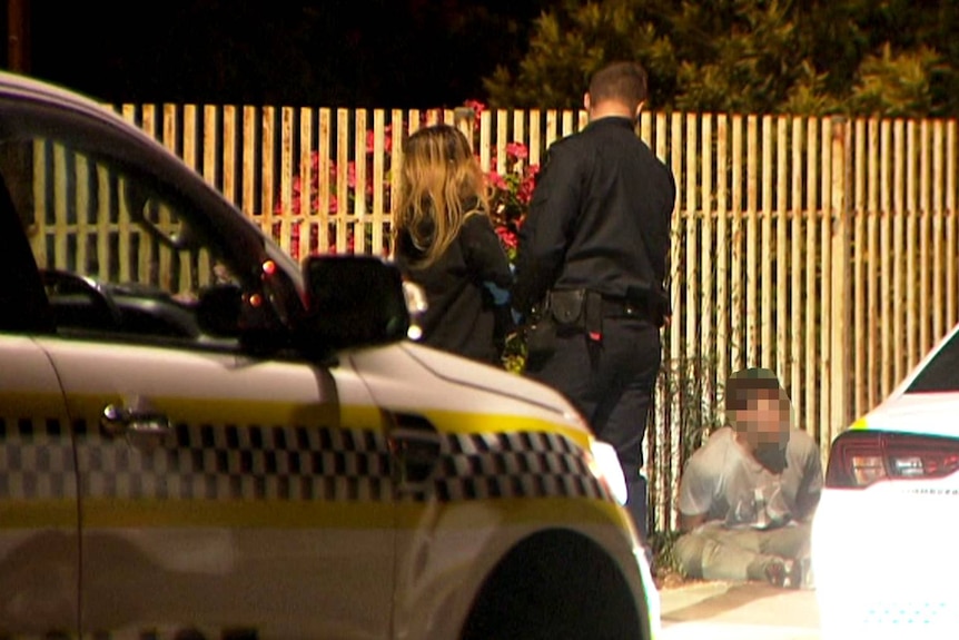 Teenagers in police custody on an Adelaide street.