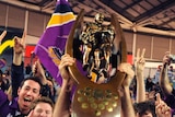 Happier days ... Cameron Smith holds aloft the premiership trophy in 2009