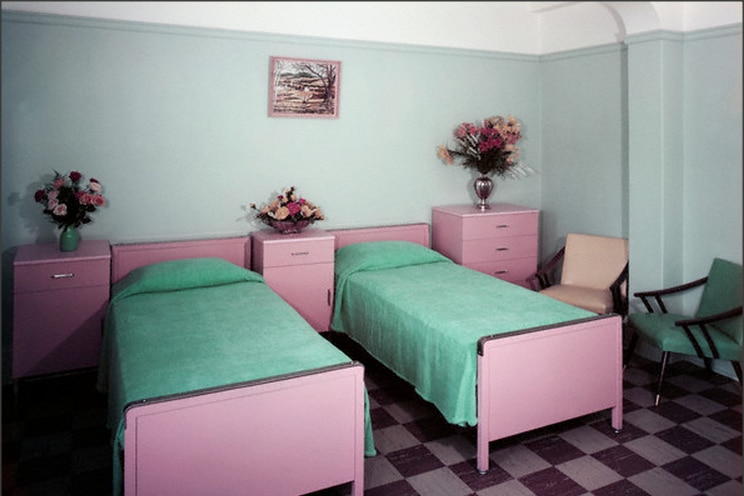 Single beds in a nursing home.